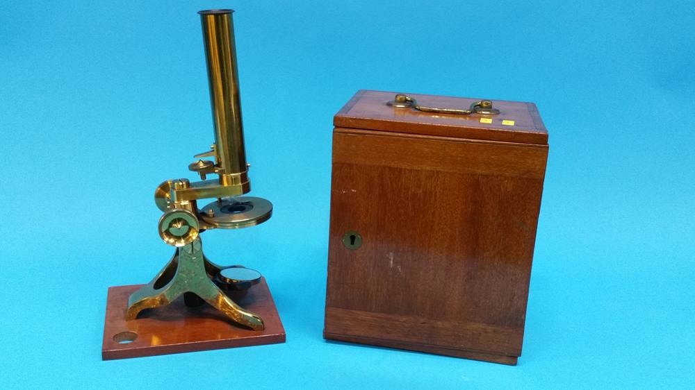A mahogany cased travelling brass microscope.