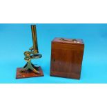 A mahogany cased travelling brass microscope.