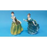 Two Royal Doulton ladies.