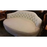 Cream leather oval settee