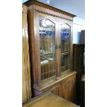 Oak bookcase with leaded doors