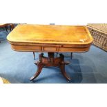 A Georgian mahogany fold over tea table