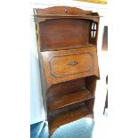 An oak bureau bookcase