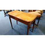 A 19th century mahogany fold over tea table