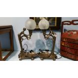 A pair of Art Nouveau style table lamps