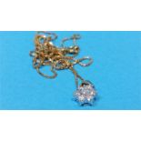 An 18ct gold diamond cluster pendant and chain, ap