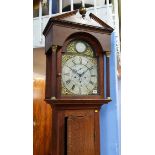 An oak cased 8 day long case clock, brass dial with subsidiary date and seconds dial, signed