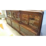 Three leaded glass two section stacking bookcases