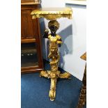 A pair of gilt Blackamoor stands