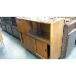 A teak sliding door cabinet