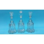 Three clear glass decanters