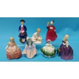 A collection of seven small Royal Doulton figures