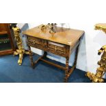 A good quality oak lowboy with single drawer, supported on turned legs, 79cm wide