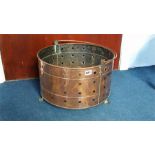 A late 19th century copper log basket