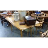 An oak gateleg table and 4 chairs
