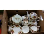 A Royal Albert Country Rose tea set and another