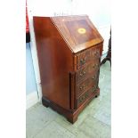 A reproduction mahogany bureau, 58 x 102cm