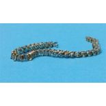 A 14ct gold and diamond tennis bracelet