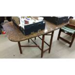 A Formica sideboard and matching gateleg table