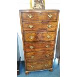 A walnut bow fronted chest of drawers, 58cm wide