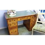 A twin pedestal oak desk, 122 x 70cm