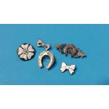 5 Various silver brooches