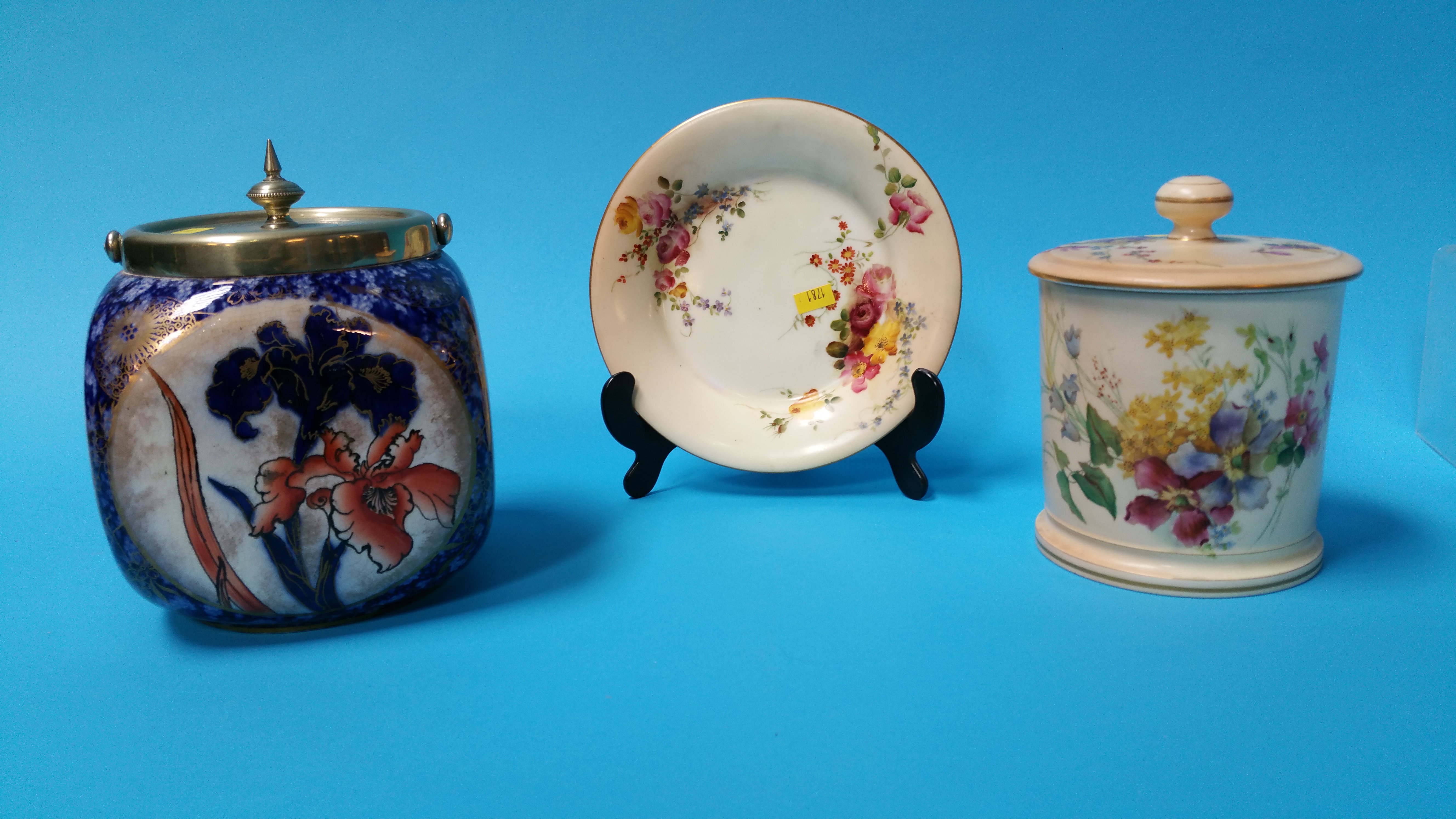 A Royal Worcester biscuit barrel with floral decor