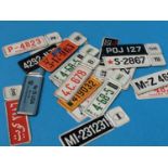 Collection of BP mini tin licence plates