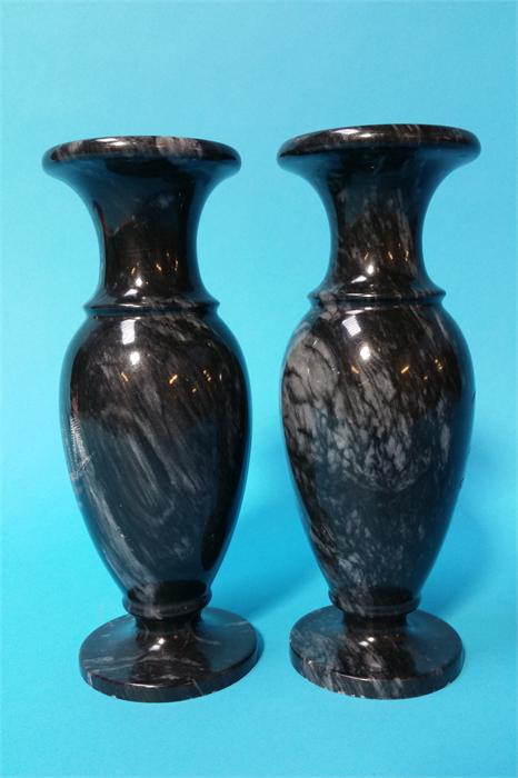 A pair of marble vases