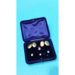 A cased 9ct gold cufflink and stud set