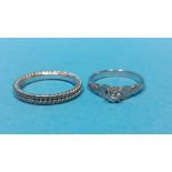 An 18ct white gold ring and 1 other