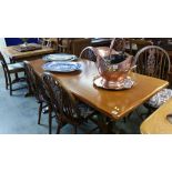 An oak refectory table and 6 chairs