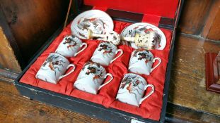 Boxed oriental coffee set and a devils work ball o