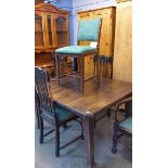 Oak dining table and four chairs