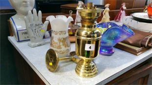 An oil lamp and gimble