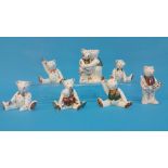 Seven Royal Crown Derby miniature porcelain teddies