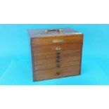 A 19th century mahogany Dentist's cabinet, with rising top, below five graduated drawers, 29.5cm