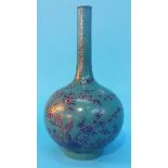 A Chinese vase with waisted neck, the baluster body decorated with birds sitting on branches,