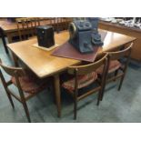 A G Plan teak extending table and five chairs