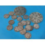 A collection of Oriental style white metal tokens