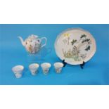 A Chinese tea set comprising tea tray, four tea bowls and a teapot