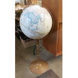 A Terrestrial globe on stand