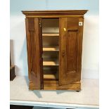 A small 2 door cabinet with fitted shelves