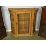 Small pine glazed side cabinet