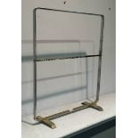 A chrome towel rail