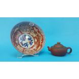 A Chinese terracotta teapot and Chinese Imari circular bowl