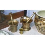 2 brass pestle and mortars etc.