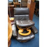 Brown leather swivel chair and footstool