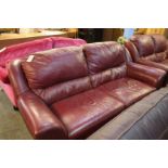 Two red leather settees