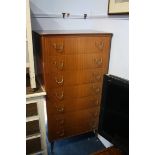 Tall teak chest of drawers